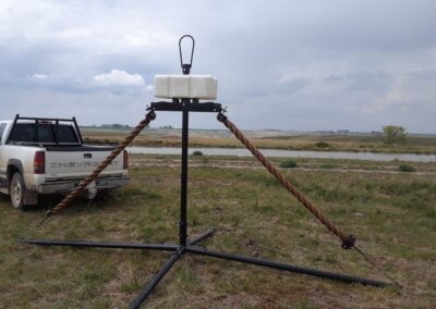 Pioneer Coupler Cattle Oiler in a field